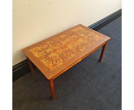 A teak tile top mid-century design coffee table, marked ‘made in Denmark’ to base, 92cm x 52cm x 40cm. IMPORTANT: Online view