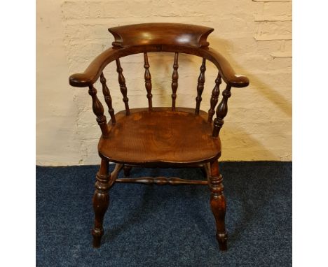 An elm turned stick back captains chair. IMPORTANT: Online viewing and bidding only. Collection by appointment via our websit