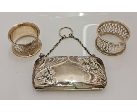 A hallmarked silver purse on chain, of Art Nouveau flower design, approx. weight 74.8gms, together with a hallmarked silver p