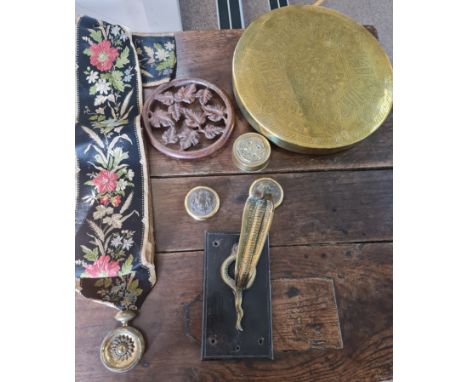 A table lamp on twisted column with brass classical design top and base, together with a wall hanging dinner gong, brass serp