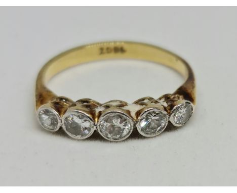 A five stone diamond ring, set with five graduating round brilliant cut diamonds, total diamond weight approx. 0.49ct, stampe