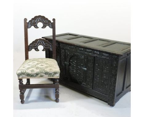 An 18th century oak coffer, with a four panel hinged lid above a carved front, 121cm, together with a 17th century style ladd