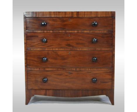 A Regency mahogany chest, containing four long graduated drawers, on swept bracket feet, 104cm