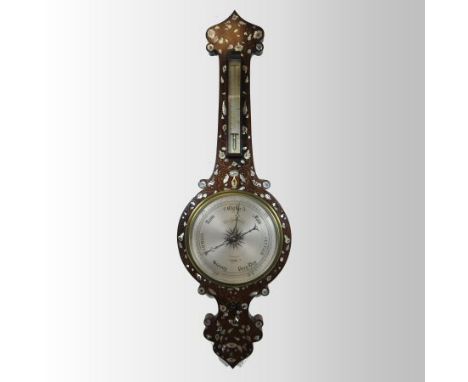 A 19th century rosewood, cut brass and mother of pearl inlaid wheel barometer, the case with an onion top, inset with a therm