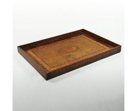 A 19th century burr yew and marquetry butler's tray, of rectangular shape, inlaid with a central conch shell, within a feathe