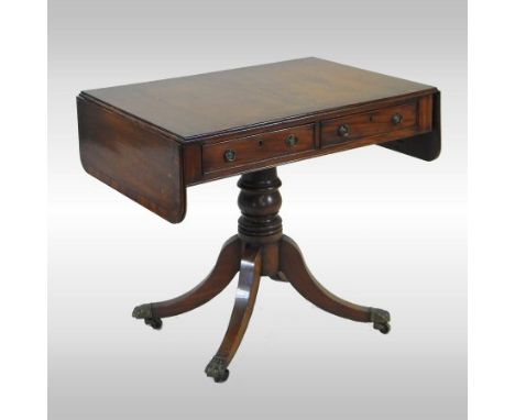 A Regency mahogany sofa table, having a hinged rectangular top, containing a pair of frieze drawers, on a turned column and s