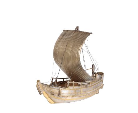 JAPANESE SILVER AND SILVER-GILT MODEL OF A BOAT (WASEN), MEIJI / TAISHO PERIOD, signed, of typical form, 31cm high