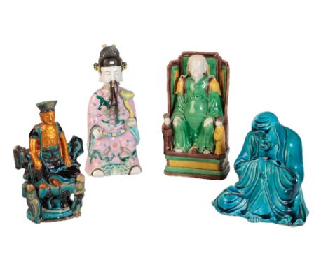 SANCAI-GLAZE POTTERY FIGURE, KANGXI PERIOD, modelled as a seated scholar flanked by two attendants, 26cm high; together with 