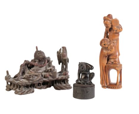 FINE CARVED HARDWOOD FIGURE OF AN ONI, EDO PERIOD, modelled seated on circular pedestal base, signed, 5cm high; together with