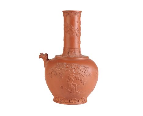CARVED YIXING 'PRUNUS' WATERPOT, KANGXI PERIOD, the tall neck finely carved with a dragon, the ovoid sides with blossoming pr
