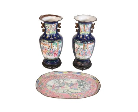 PAIR OF CANTON ENAMEL VASES, QING DYNASTY, 19TH CENTURY, the sides painted with panels depicting courtiers, reserved against 