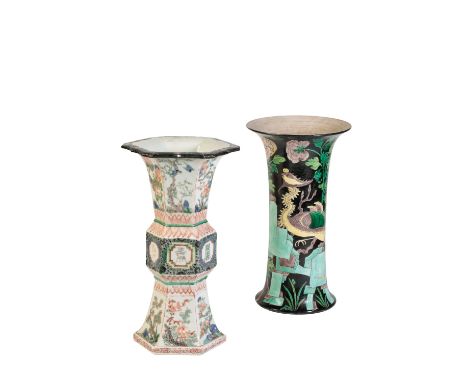 FAMILLE NOIR CYLINDRICAL VASE, LATE QING DYNASTY, painted with a phoenix within a verdant landscape, 33cm high; together with