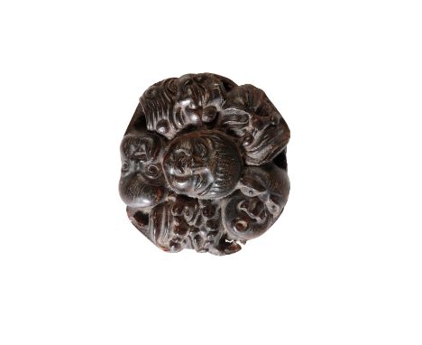 JAPANESE PRESSED HORN NETSUKE, EARLY MEIJI PERIOD, modelled as eleven noh masks, 4cm wide