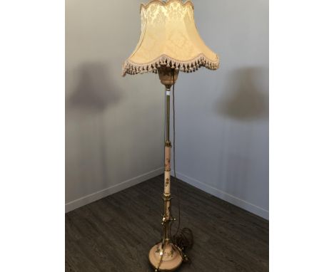 CERAMIC AND BRASS HEIGHT ADJUSTABLE STANDARD LAMP, converted to electricty, the detachable oil reservoir on a column with gil