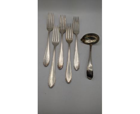 Silver stamped 800 to include a sauce ladle and five forks all having engraved initials to the terminals, total weight 342.9g