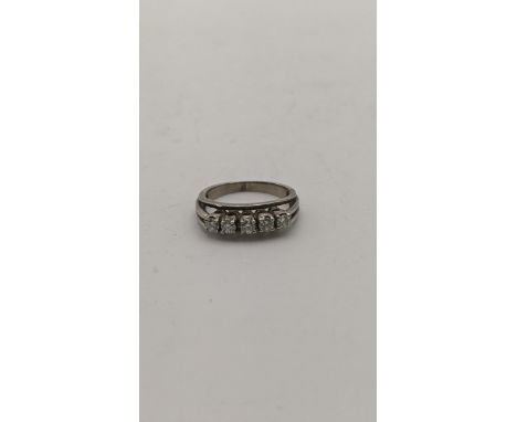 A white metal and five stone diamond ring, 3g, size K 1/2Location:If there is no condition report shown, please request 