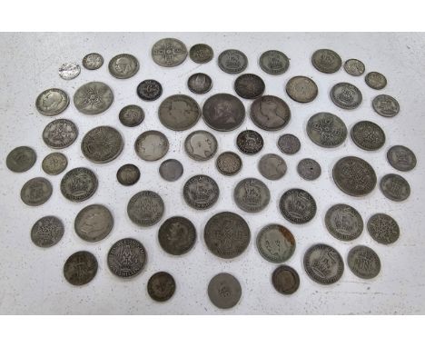 A collection of Silver Coinage to include 1859 'Gothic' Florin, South Africa 1896 2.5 Shillings, 1886 US Dime, and others alo