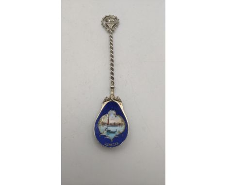 A silver and enamel tourist spoon stamped 800 having a shell bowl and decorated with enamel, depicting Venezia, 18.5cm lLocat