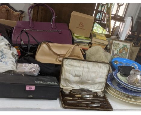 A mixed lot to include a silver manicure set, two white metal belt buckles, mixed ceramics, an ECM -959/1 electric condenser 