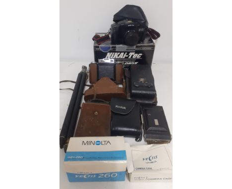 A quantity of vintage cameras and accessories to include a Nikai-Tec Automatic power drive, an Agifold, Brownies and Kodaks. 