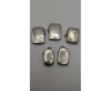 A group of 5 silver vest cases to include one example made by C.T Burrows and sons, hallmarked Birmingham 1915, along with ot