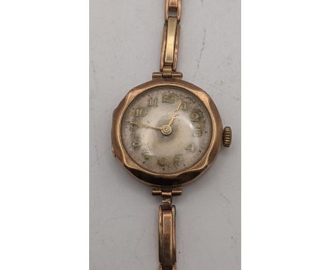 A 9ct gold ladies manual wind wristwatch on a 9ct gold expanding strap A/F 16.3gLocationIf there is no condition report shown
