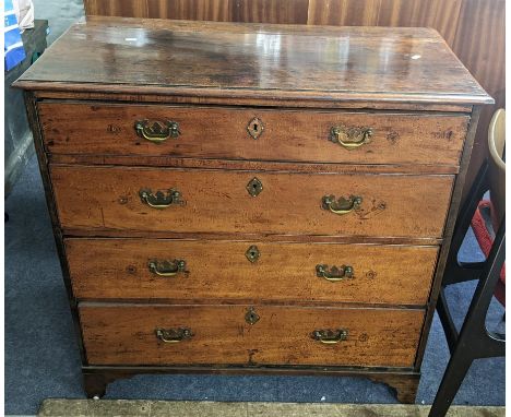 An 18th century fruitwood chest of four long drawers, standing on bracket feet, 90h x 92wLocation:If there is no condition re
