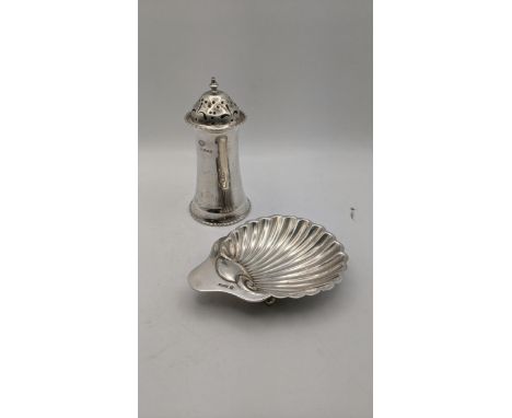 Silver to include a butter dish fashioned as a seashell, together with a sugar caster, total weight 232.2gLocationIf there is