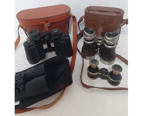 Binoculars to include a pair of Nipole 8x30 field binoculars and travel case, vintage 8 lens racing binoculars in leather cas