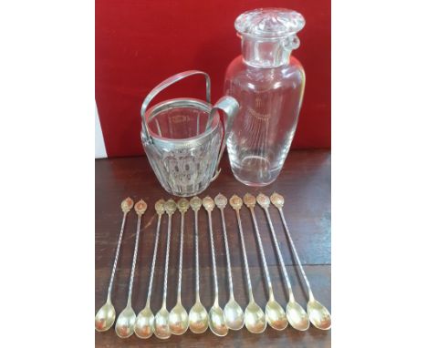 A quantity of decorative drinks related items to include silver plated and gilt long handled spoons, each numbered, a glass i