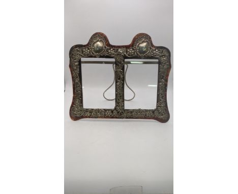 A Henry Manton silver and tortoiseshell photo frame having a floral design hallmarked Birmingham 1887Location:If there is no 