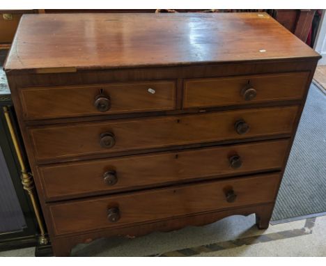 An early 19th century mahogany chest of two short and three long graduated drawers, on bracket shaped feet, 105h x 113.5wLoca