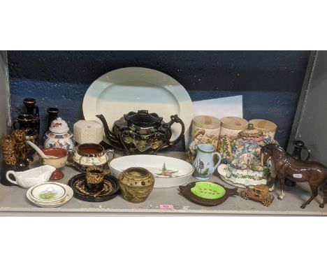 Mixed ceramics and pottery items to include a Beswick pottery fish, Beswick horse, a musical teapot ornament and other itemsL