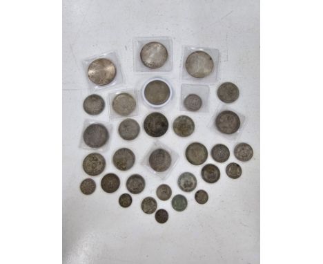 A collection pf pre 1947 British Halfcrown, Two Shillings, Shillings, Sixpence and Threepence, along with USA Kennedy Half Do
