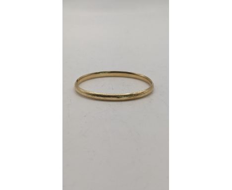 A gold bangle stamped 14k having engraved decoration, 4gLocation:If there is no condition report shown, please request 