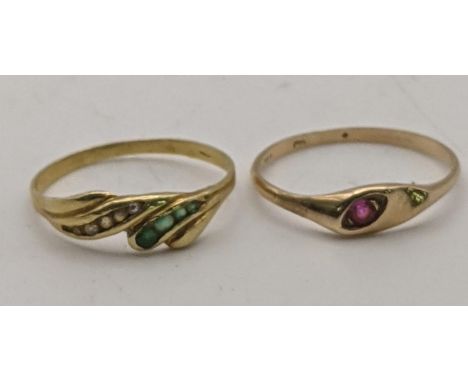 Two yellow gold rings to include one example set with green and clear paste stones tested as 18ct 1.2g, together with yellow 