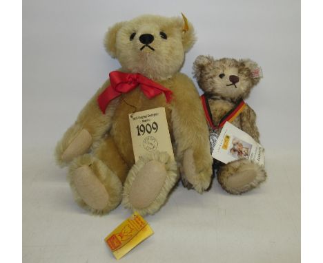 Steiff 1909 replica teddy bear, with tags, H32cm and a 2002 Deutschlandbar, H22cm 