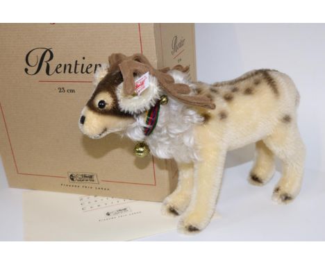 Steiff 'Reindeer', white tag 037788, limited edition 798/2000, 2003. Blonde mohair, complete with felt collar with bells, H23