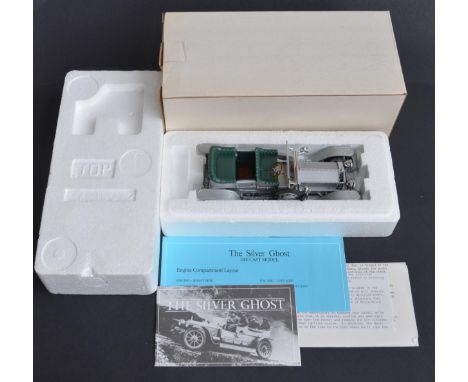 Two boxed 1/24 scale diecast Rolls Royce models to include a Franklin Mint 1907 Silver Ghost (mint condition with original pa