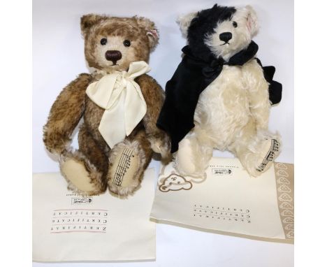 Two limited edition musical Steiff bears, 'The English Teddy Bear' 1639/4000 and 'Phantom of the Opera' 418/3000. Both in dus