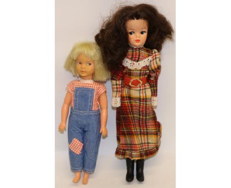 Sindy; lovely lively Sindy 1976 wearing Highland Fling, dark  brown hair, head stamped 033055x and a blonde Patch doll, weari