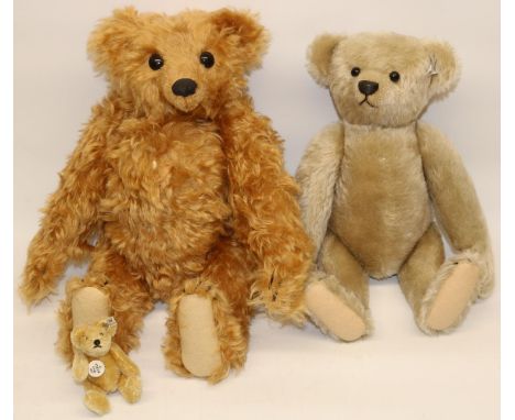 Three Steiff bears: 1997 Collectors Club miniature bear, 1911 replica bear in blonde mohair, and one other in russet mohair, 