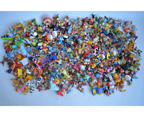 Extensive collection of plastic, metal and ceramic cartoon, fantasy and giveaway figures (Disney, warner Bros etc to include 