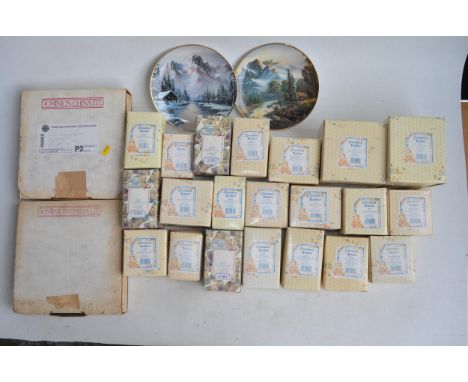 Collection of boxed ceramic Cherished Teddies figurines and 4 collectors plates 