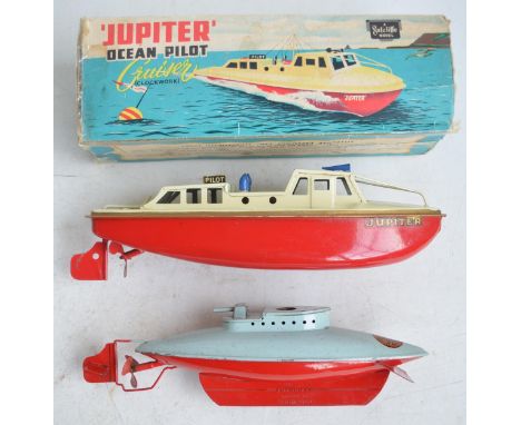 Two vintage Sutcliffe Models clockwork tinplate boat models to include a boxed "Jupiter" Ocean Pilot Cruiser (model in very g