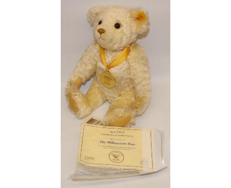 Steiff Millennium Bear with gold medallion on yellow ribbon, with COA, H28cm 