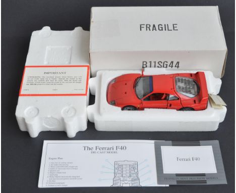 Boxed Franklin Mint 1/24 scale highly detailed diecast Ferrari F40 model in mint condition with original paperwork and attach