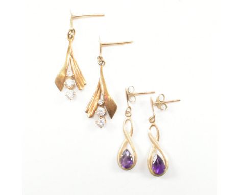 A pair of vintage 9ct yellow gold and amethyst and yellow metal drop earrings. The first pair of infinity form having pear cu