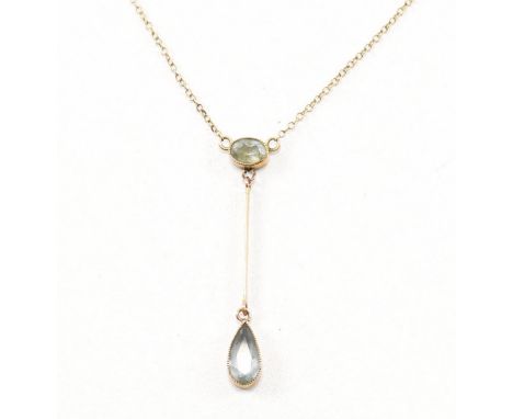 An antique 9ct gold and aquamarine pendant necklace. The necklace comprised of fine cable links united by a spring ring clasp