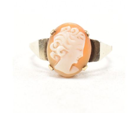 A vintage 9ct yellow gold and carved cameo ring. The ring having an oval carved shell cameo depicting the portrait of a young